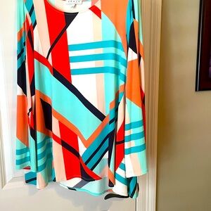 Beautiful multicolored tunic by Chaus. Perfect for a festive occasion